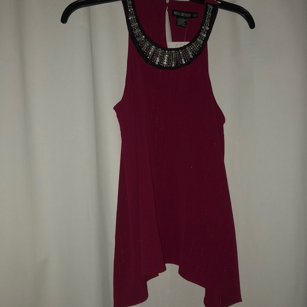 burgundy top with rhinestones around collar